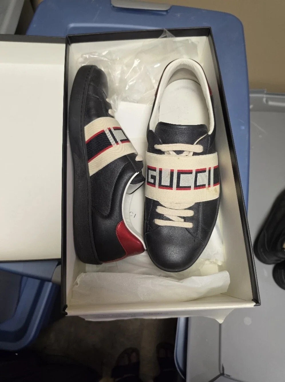 Gucci Men’s Black Leather New Ace Sneakers with Red Heel and Beige Branded Strap